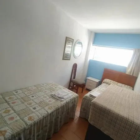 Апартаменти Apartamento Centrico Саншеншо